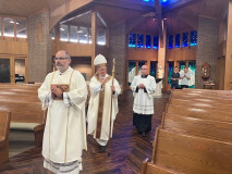 Bishop-Ricken- blesses congregation at Women-Religious-Celebration