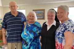 Quilt-of-Valor-Award-Sister-Charles-Ann-with-friends